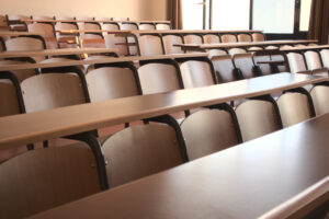 Empty university classroom chairs