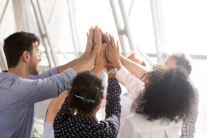 Students giving each other a group high five
