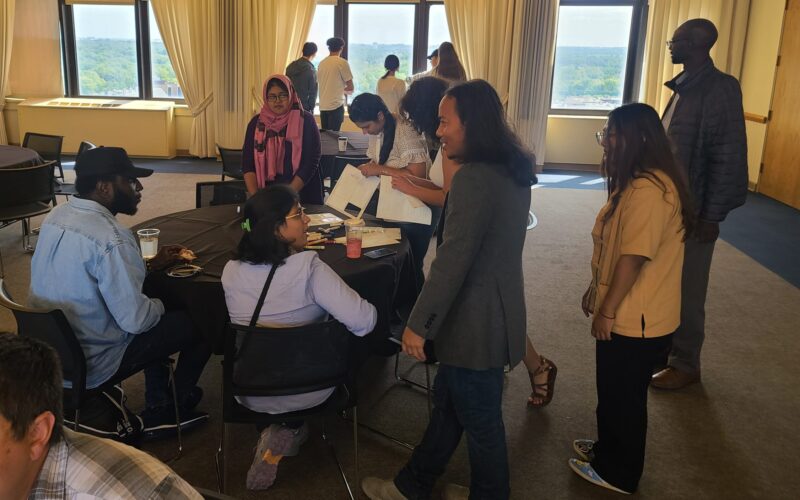 Group of TAs in the Sky Room of the Holmes Student Center