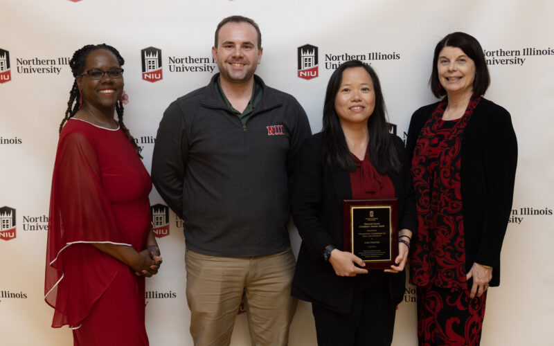 Linh Nguyen receiving award