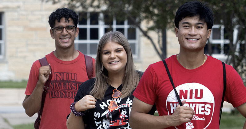Open pedagogy banner: Three smiling NIU students