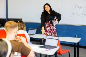 Prof. Pallavi Singh teaching at front of classroom